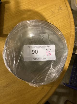 Set of 13 clear glass plates, 8-1/8 inches, wrapped, with auction label showing quantity and lot number 90.