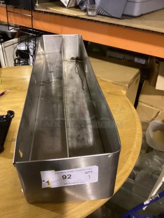 Stainless steel speed rail, 2-1/4"x8-3/4", fair condition, auction tag showing lot 92 and quantity 1.