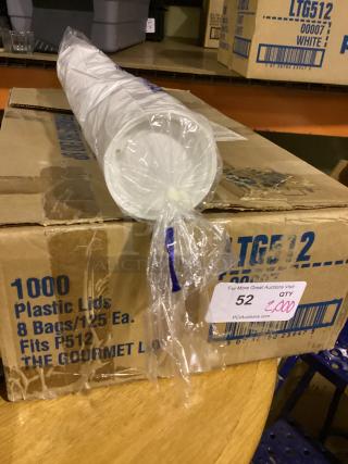 Box containing 1000 "The Gourmet Plastic Lids," labeled to fit P512. Total qty: 2,000 across boxes. Auction tag visible.