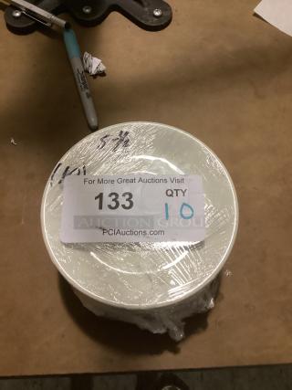 10 medium desert plates, 5-5/8 inches, wrapped for auction. Labeled "133 QTY 10" from PCAuctions.