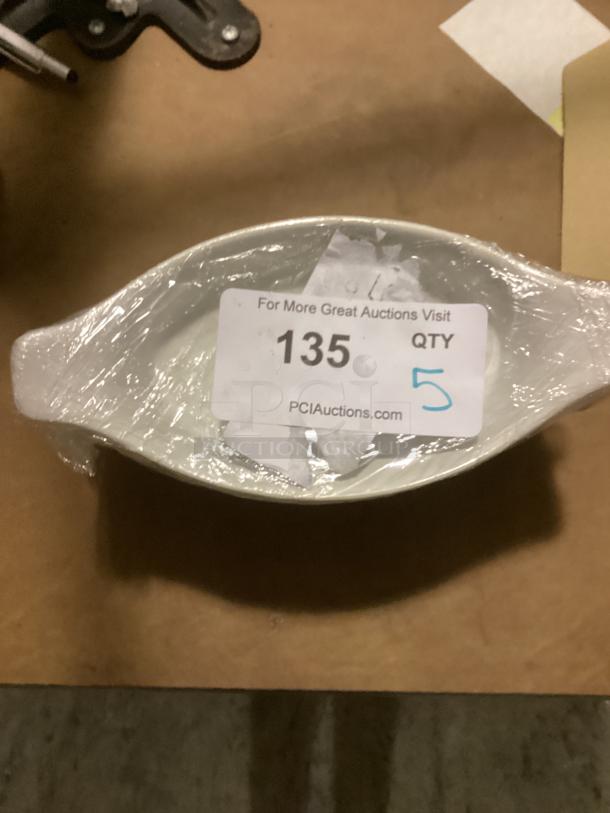 Small gravy bowl wrapped in plastic with auction label "135" indicating quantity of 5.
