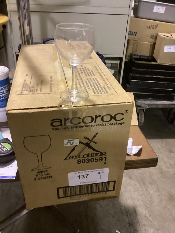 Small wine glass on top of an Arcopoc box, 5-1/8" height, 6.5 oz capacity, labeled for durability. Auction bid x3.