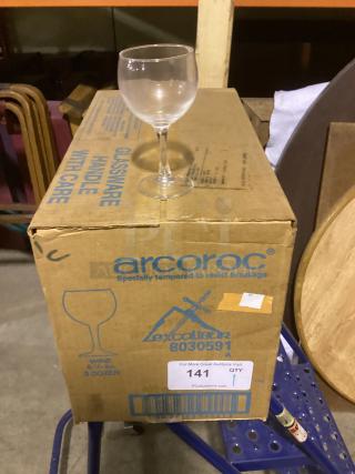 Small wine glass, 5-3/8", atop an Arc International box labeled "Arcocroc," indicating tempered glassware, Qty: 1.