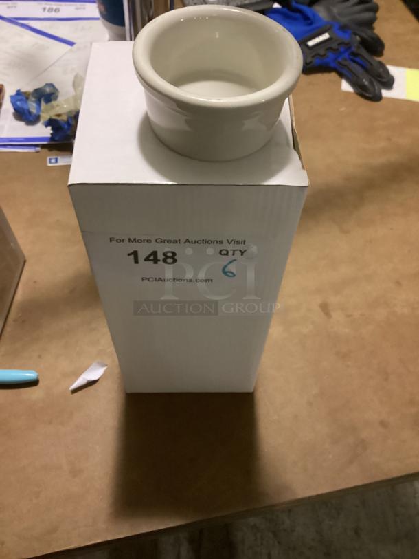 Small white sauce bowl, 3-1/8 inches, placed on a box. Lot of six. Box shows bid details and auction website.