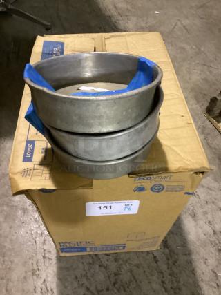 Metal 7-1/2 inch bowls, stacked, set of 18. Good condition. Auction item with label indicating quantity and lot number.