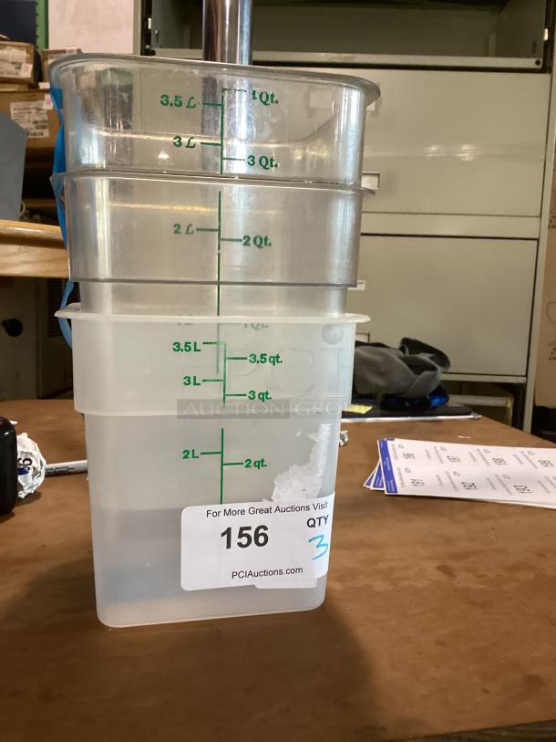 Three plastic food measurement containers, each marked in liters and quarts, with a label indicating quantity 3.