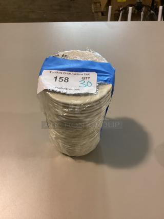Stack of 30 small scalloped dessert plates, 5-1/2 inches, wrapped in plastic with auction tag, item number 158.