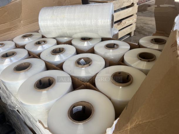 10 large shrink wrap rolls in a partially opened cardboard box. Rolls appear new with cardboard cores.