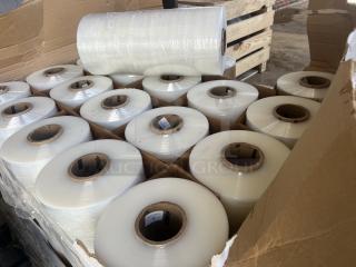 10 rolls of shrink wrap in open cardboard box, each roll with cardboard core, clear film, new condition. Auction lot.