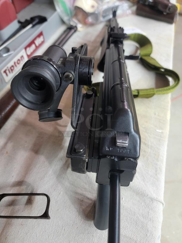 *Credit Card Transaction Only 🪪 - ATF Approved* ⚡️ FFL SHIP ONLY! ⚡️Collectors and firearms enthusiasts, attention!  RARE OPPORTUNITY! Hungarian AMP-69 7.62x39 Rifle! This is a Hungarian AMP-69 Grenade Launching Semi Auto AK type pre-89 rifle with the base being the AMD 63/65 platform built on a FEG SA 85M receiver by FEG / Kassnar Imports Inc. Typically these came in as Post Sample Machine guns by TGI of Tennessee however it is believed that these Semi Auto copies were imported directly by Kassnar before they went out of business in March 1989. All of the marked parts match the original serial number “KP 1801” as seen on the dust cover except for the scope and scope mount. The design was built specifically for grenade launch use with reciprocating forearm and collapsible, spring loaded butt stock, a special gas block with lever for modifying gas volume for grenade or rifle round use, a fully rifled barrel with a special muzzle extension attachment for redirecting gas to propel a grenade round, a special optic mounting rail and low power optic designed for launching grenades up to 400 meters. Must Ship to FFL, Check local laws regarding “Assault Weapons” BEFORE bidding. Pre 1989

Condition: This rifle is in Excellent condition and shows little to no signs of actual use. The bore is a mirror with crisp rifling. The stocks have some very minor marks from handling and the reciprocating components show a bit of finish loss due to standard wear. - Image 1 of 10