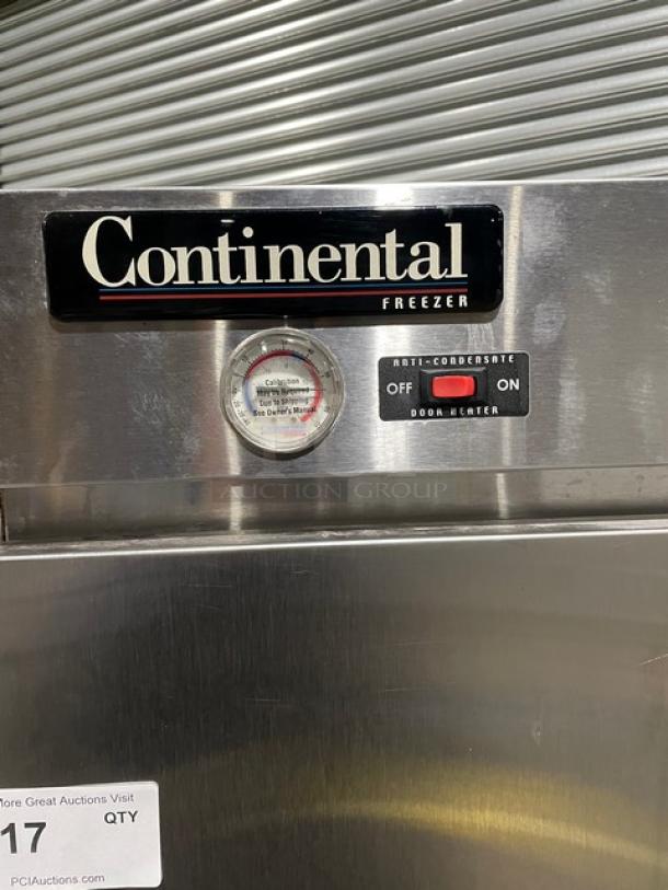 Continental freezer front panel with logo, temperature gauge, and anti-condensate door heater switch; stainless steel finish.
