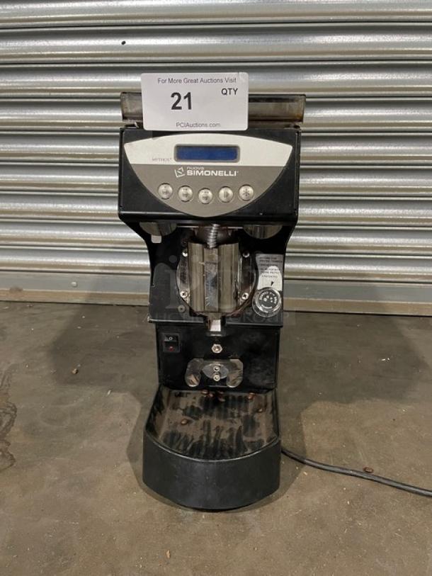 Nuova Simonelli MDXS espresso grinder, black, used condition, visible wear; auction tag indicates lot number 21.