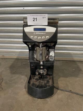 Nuova Simonelli MDXS espresso grinder, black, used condition, visible wear; auction tag indicates lot number 21.