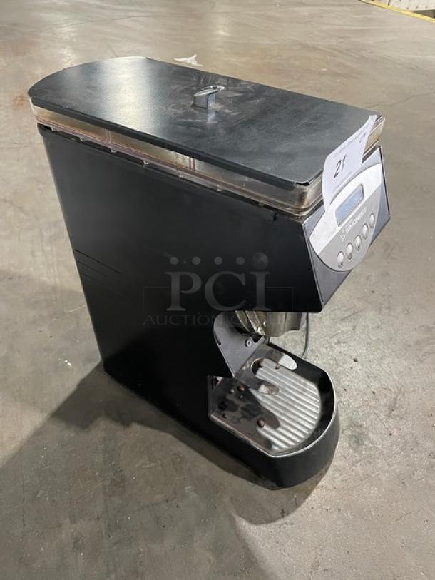 Black commercial coffee grinder with digital display, model Smart Grinder Pro. Light wear, label marked "21".