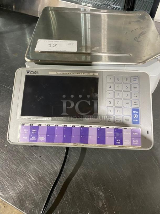 Digi electronic scale with keypad and digital display, stainless steel platform, used condition, model SM-5000B.