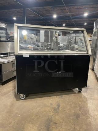 Duke Subway Style Commercial Black Powder Coated Stainless Steel Sandwich Condiment Prep Table! With Tri-Channel Cold Pan! With Angled Glass Sneeze Guard! With Stainless Steel Functionality Shelfing! With Enclosed Base! Model: SUB-CP-TC60 M SN: 06142761! 120V 1 Phase! On Casters!