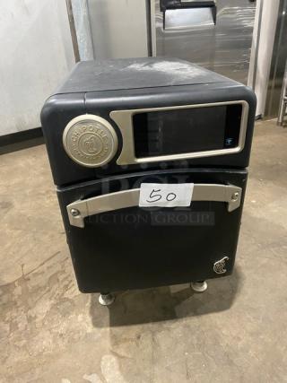 TurboChef! 2021! Late Model! Chipotle Style Commercial Black Electric Powered Countertop Cook Press Edition Ventless Rapid Cook Turbo Oven! With Crank Bar! Model: NGO SN: NGOTD43530! 208/240V 1 Phase! On Legs! - Item #1189414
