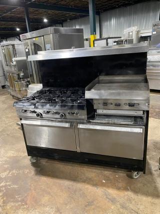 Garland Commercial Stainless Steel Natural Gas Powered 6 Burner Range/Raised Flat Griddle Split Top & Double Oven Combo! With Built-In Broiler/Cheese Melter! With Back Splash & Overhead Salamander Shelf! With Wired Oven Racks! On Casters! - Item #1188473
