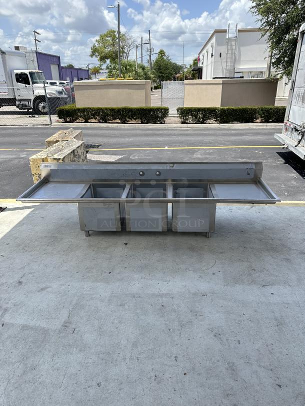 BRAND NEW! SCRATCH AND DENT! Regency - Three Compartment Sink with 2 Drainboards - Image 1 of 3
