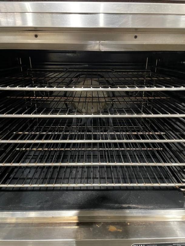 SWEET! Blodgett Commercial Stainless Steel Natural Gas Powered Double Stacked Dual-Flow Convection Oven! With Thermostatic Controls! With Wired Oven Racks! SN: 082902RA018T! On Casters! 2X Your Bid Makes One Unit! - Image 6 of 12