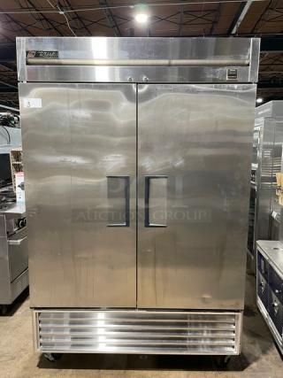 True Commercial Stainless Steel Solid 2 Door Reach In Freezer! With Poly Coated Wire Racks! Model: TS-49F SN: 1-3278014! 115V 1 Phase! On Casters!