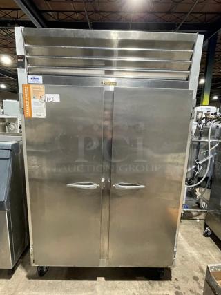 Traulsen G-Series Commercial Stainless Steel Solid 2 Door Reach In Freezer! Energy Star Certified! With Poly Coated Wire Racks! Model: G22010 SN: T18804F09! 115V 1 Phase! On Casters! - Item #1190423