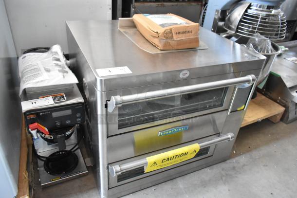 Stainless steel Turbochef oven in good condition, double doors with caution label. Includes a Bunn coffee brewer.