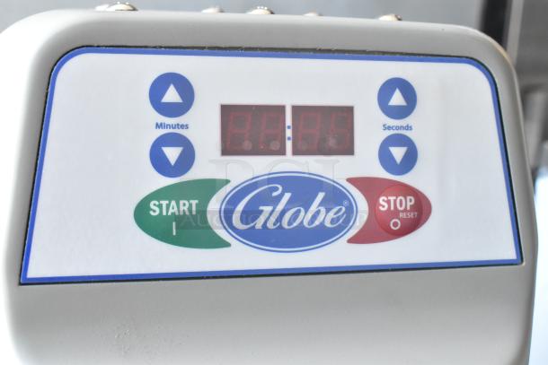 Globe branded equipment control panel with digital display, featuring start and stop buttons.