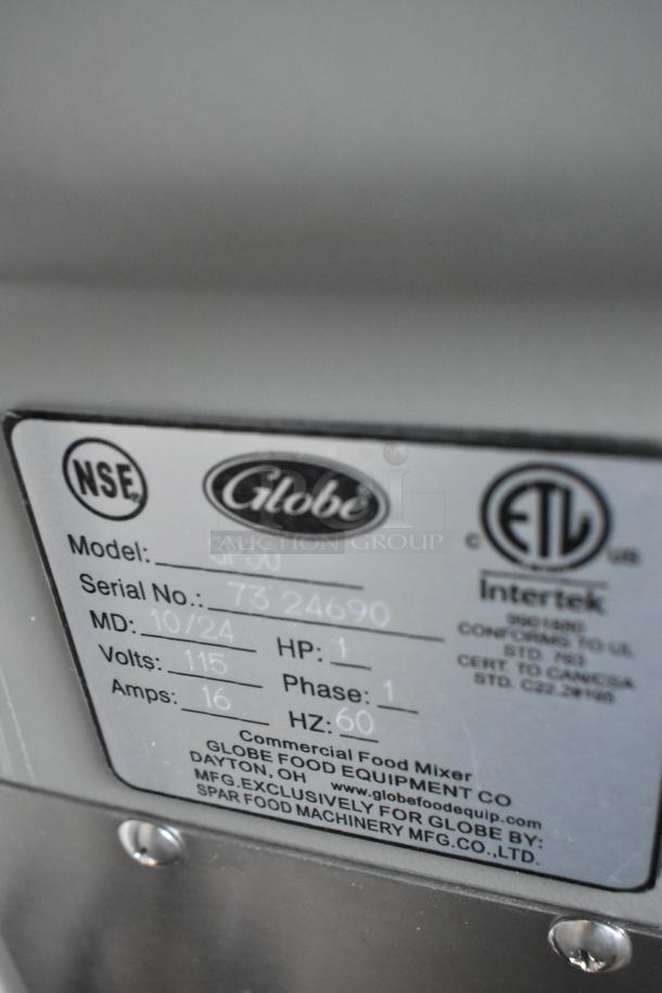 Globe SP30 commercial food mixer label showing model, serial number, electrical specs, and certification marks.