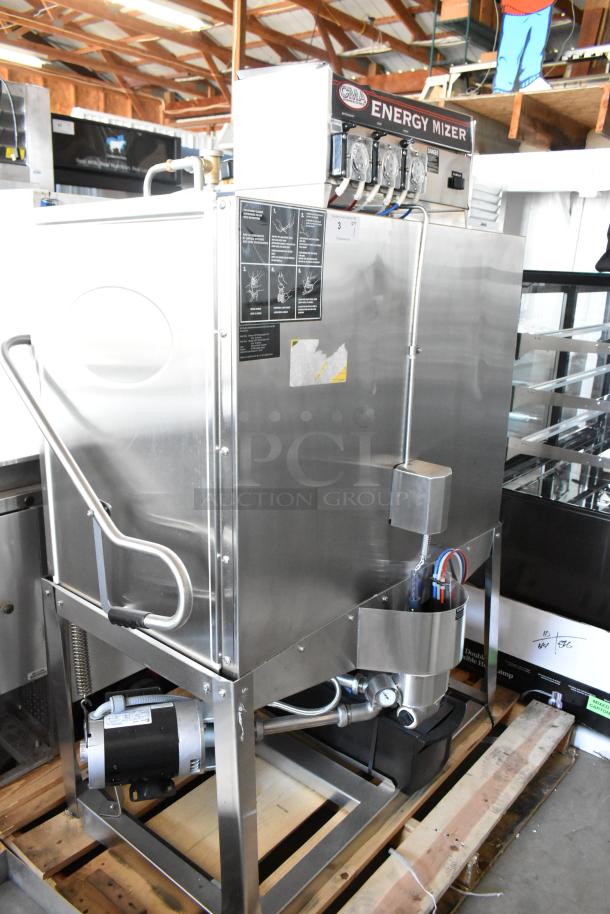 Stainless steel commercial dishwasher, CMA Energy Mizer model, features control dials, instructions visible, good condition.