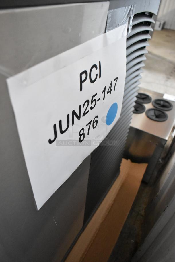 Industrial cooling unit with a label marked "PCI JUN25-147 876" indicating inventory status. Appears in used condition.