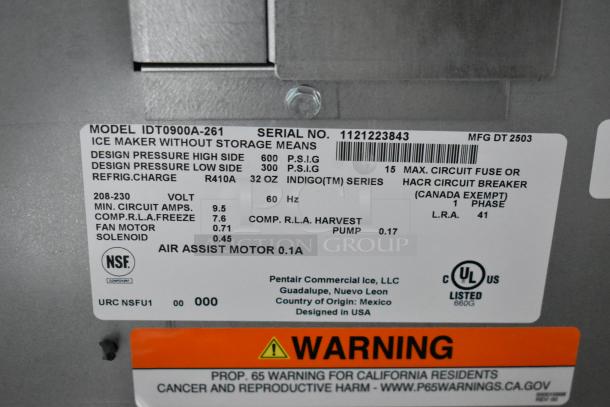 Industrial ice maker label showing model IDT0900A-261, serial number 1121223843, R410A refrigerant, 208-230V, manufactured by Pentair.