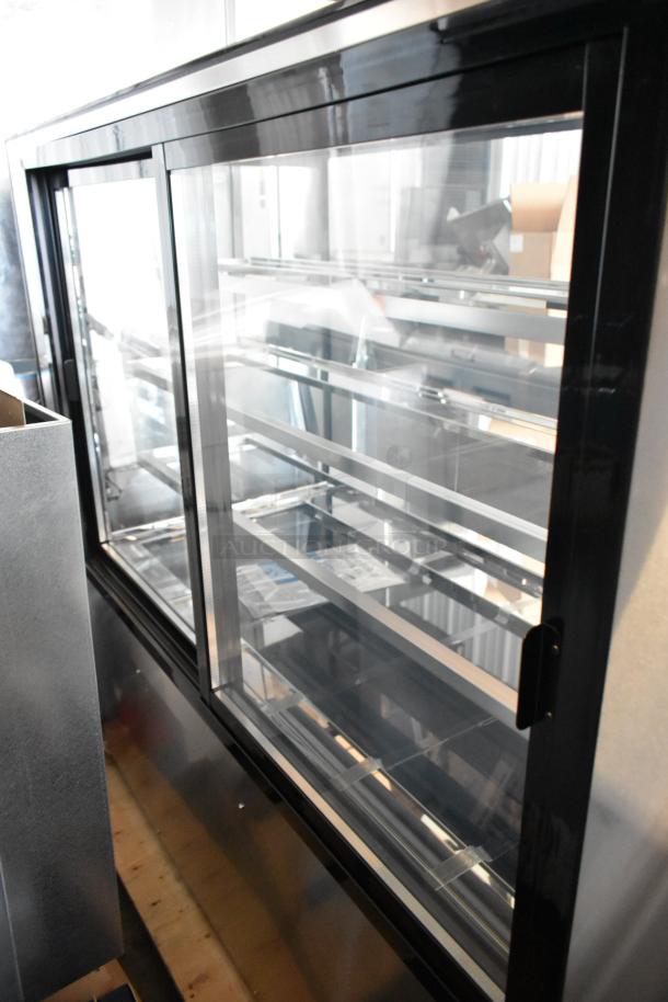 Black framed display cabinet with glass sliding doors, multiple shelves, in excellent condition for retail or exhibition use.