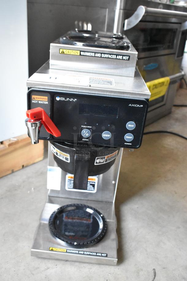 Bunn Axiom coffee brewer, stainless steel, red hot water handle, caution labels, digital display, used condition.