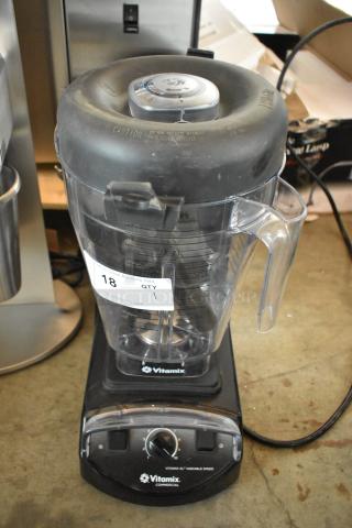 Vitamix XL commercial blender, black base, clear pitcher with measurements, variable speed dial, visible auction label.