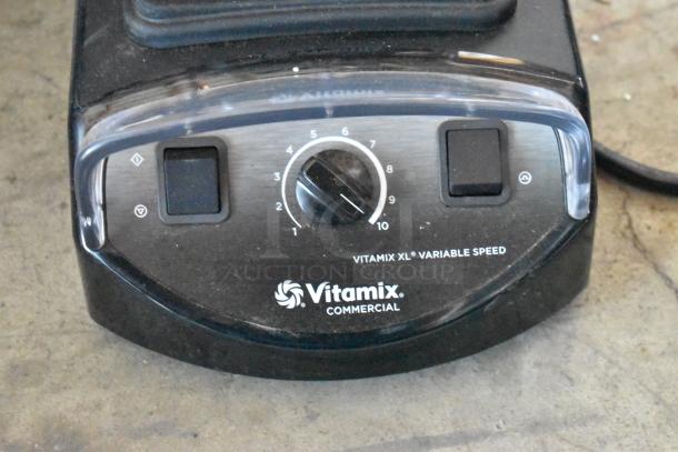Vitamix XL Variable Speed Blender base, black, commercial grade, features 10-speed dial, minor wear visible.