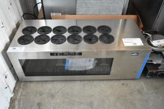 Stainless steel countertop wine cooler by Summit, 12 bottle capacity, digital controls, in good condition. Model 46ASTC12.