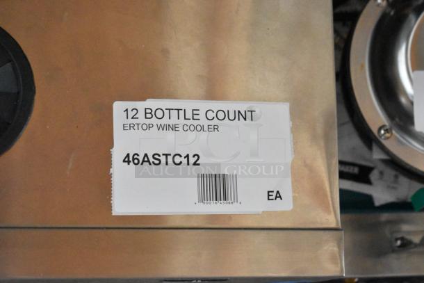 12-bottle Ertop wine cooler, model 46ASTC12, featuring a metallic finish with label detailing capacity and barcode.