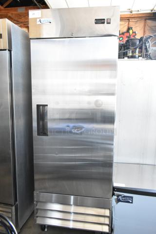 Avantco commercial stainless steel refrigerator, single door, in good condition with visible dents, model and settings panel at top.