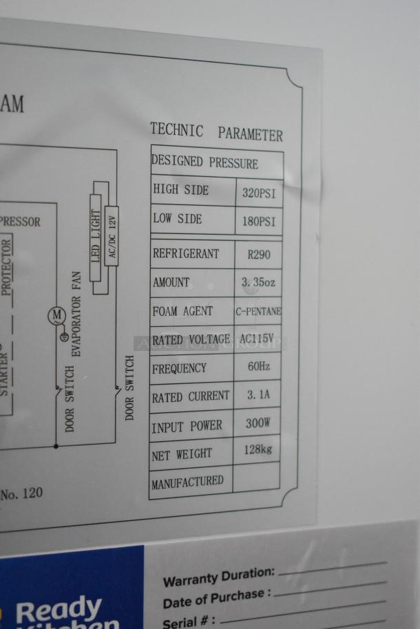 Technical specifications label for equipment; 320 PSI high pressure, R290 refrigerant, 300W input, 128kg weight.