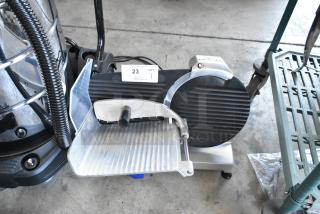 BRAND NEW SCRATCH AND DENT! Vollrath SLM250/S 40950 Stainless Steel Commercial Countertop Meat Slicer w/ Blade Sharpener. 115 Volts, 1 Phase. - Item #1192498