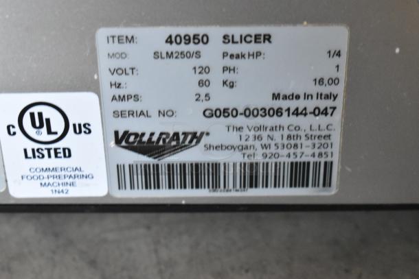 Vollrath Slicer, Model SLM250/S, 120V, 60Hz, 2.5 Amps, 1/4 HP. Serial G050-00306144-047. Made in Italy. UL listed.