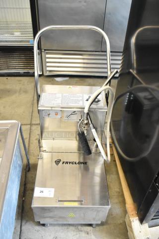 Fryclone oil filtering machine with hose, stainless steel finish, warning labels, and model number 26. Used condition.