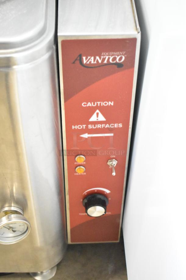 Avantco commercial food warmer with temperature control, caution label for hot surfaces. Features power and heater indicators.