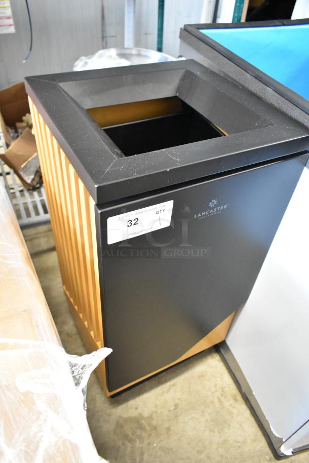 Lancaster trash receptacle, black with wood accents, excellent condition. Auction label "32" visible.