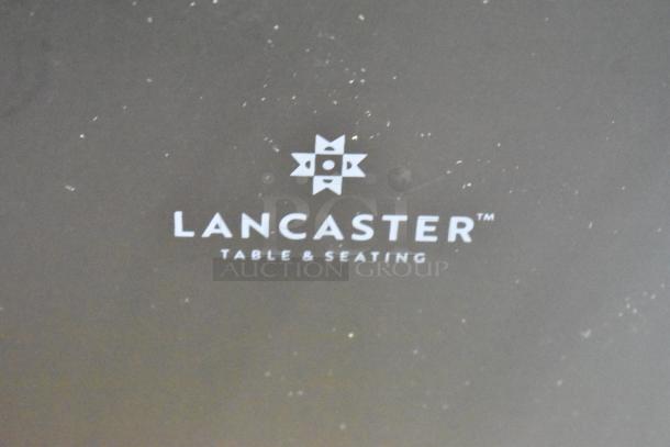 Lancaster Table & Seating logo on a black surface; indicates brand identity.