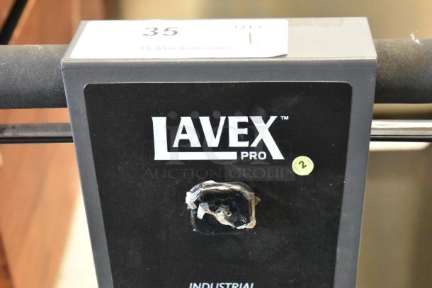 Lavex Pro industrial cleaning equipment in fair condition, marked with inspection sticker "2" and auction lot number 35.