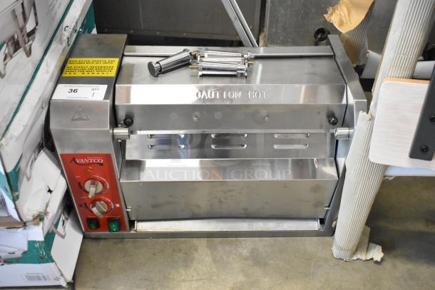 Avantco stainless steel commercial bun toaster, adjustable heat controls, sticker reads "Caution Hot," appears in good condition.