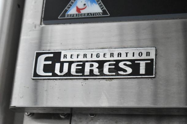 Everest refrigeration unit with visible logo and wear. Stainless steel surface showing scratches.