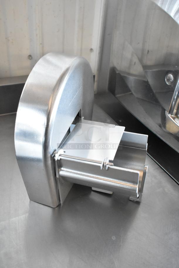 Industrial stainless steel machine part, features a cylindrical housing and a sliding component. Condition appears excellent.